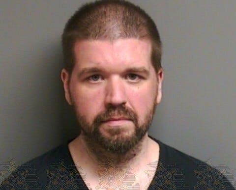 The sister of a man accused of murdering his girlfriend and living with her corpse in the basement of his home for seven months took the stand on Thursday during a preliminary hearing to determine if the man is fit for trial.