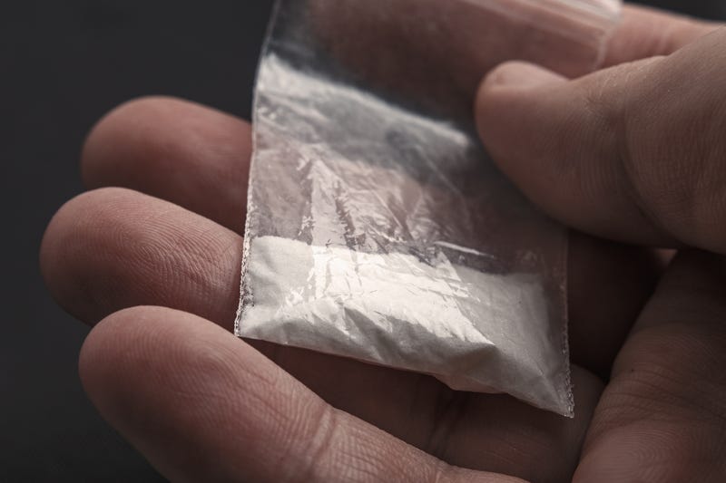 A 59-year-old man was arrested by authorities after a small plastic baggie containing cocaine was left behind when he paid for items at an Alpena Walmart.