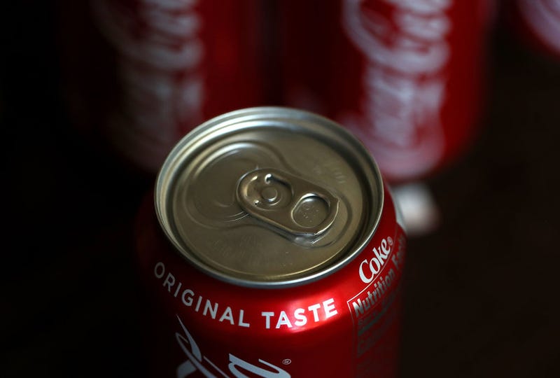 Cans of Coca Cola are displayed on July 25, 2018 in San Rafael, California.