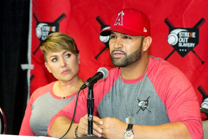FILE: Deidre Pujols and Albert Pujols attend the Strike Out Slavery Press Conference at Angel Stadium on August 9, 2018 in Anaheim, California.