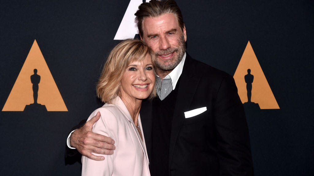 Still 'hopelessly devoted!' Olivia Newton-John sends sweet message to John Travolta and his family