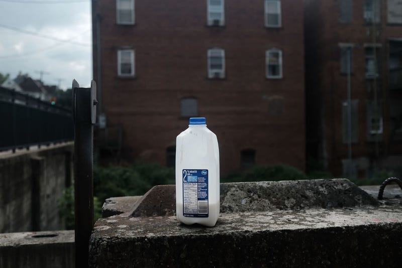 A jug of milk sits along a wall in Clarksburg on August 22, 2018 in Clarksburg, West Virginia. 