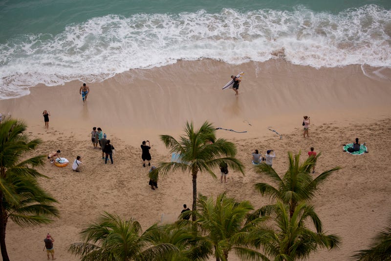 The threat of Hurricane Lane does not deter the tourists and locals from playing in and around the ocean as Hurricane Lane approaches Waikiki Beach on Kalakaua Ave on Thursday, August 23, 2018 in Honolulu, Hi.