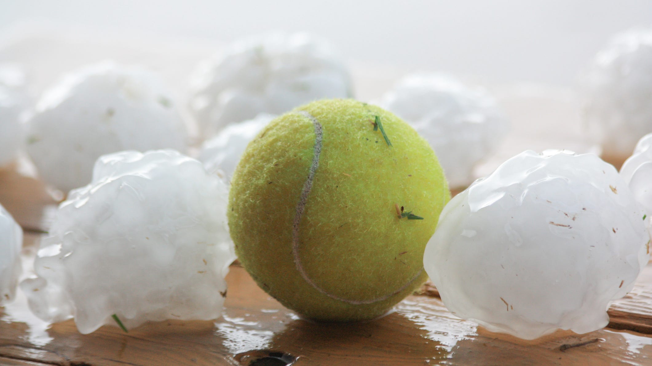 Hail ranging in size from quarters to softballs pelts areas of North Texas Monday evening