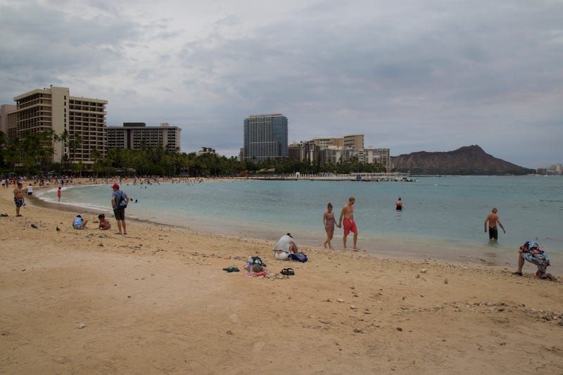 Tourists continue to crowd the beaches as seen from the Hilton Hawaiian Village beach in Waikiki, despite warnings to stay indoors as Hurricane Lane approaches Oahu on August 24, 2018 in Honolulu, Hawaii.