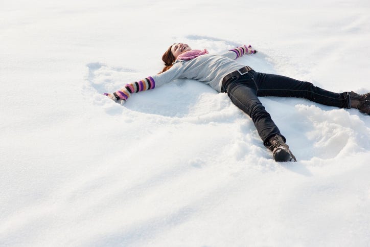 Woman Making Snow Angels