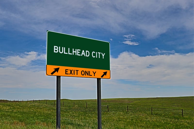 A freeway sign directs drivers to Bullhead City, AZ