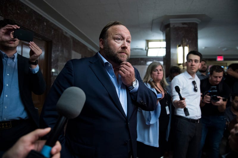 Alex Jones of Infowars, conducts a news conference outside a Senate Intelligence Committee hearing in Dirksen Building where Sheryl Sandberg, Facebook COO, and Jack Dorsey, Twitter CEO, were testifying on the influence of foreign operations on social media on Sept. 5, 2018.