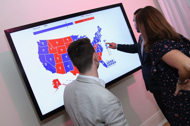 Attendees experiment with an electoral map during the "Full Frontal With Samantha Bee" Presents "This Is Not A Game: The Game" press junket on September 5, 2018 in New York City.