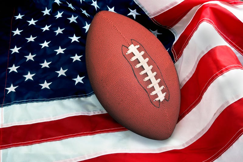 American flag with football