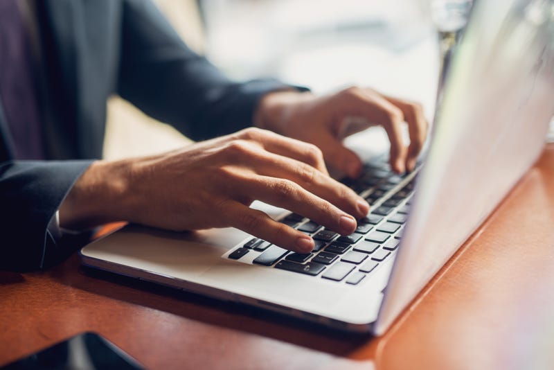 person using laptop
