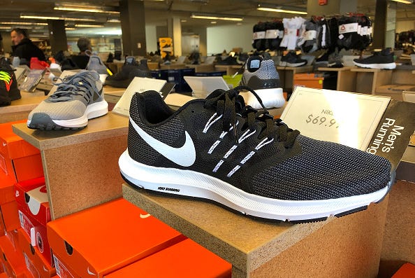 Nike running shoes are displayed at a DSW store on September 14, 2018 in San Francisco, California.