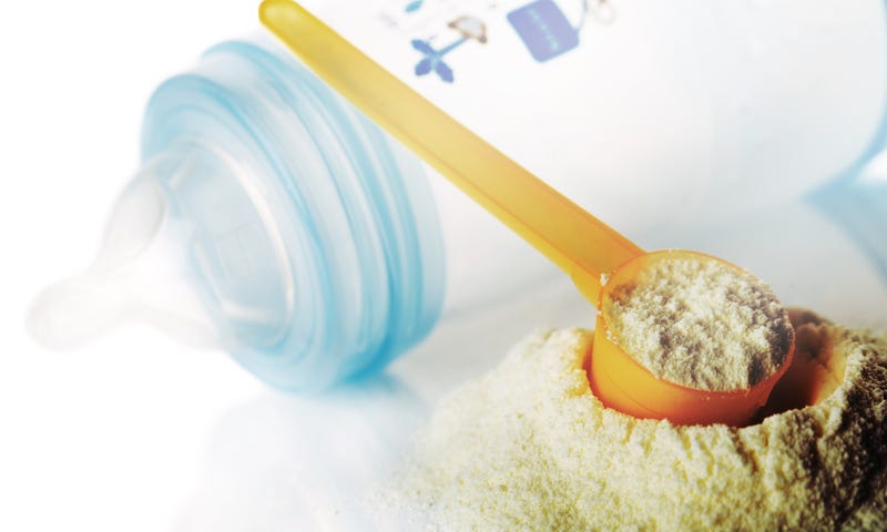 Preparation of mixture baby feeding close up