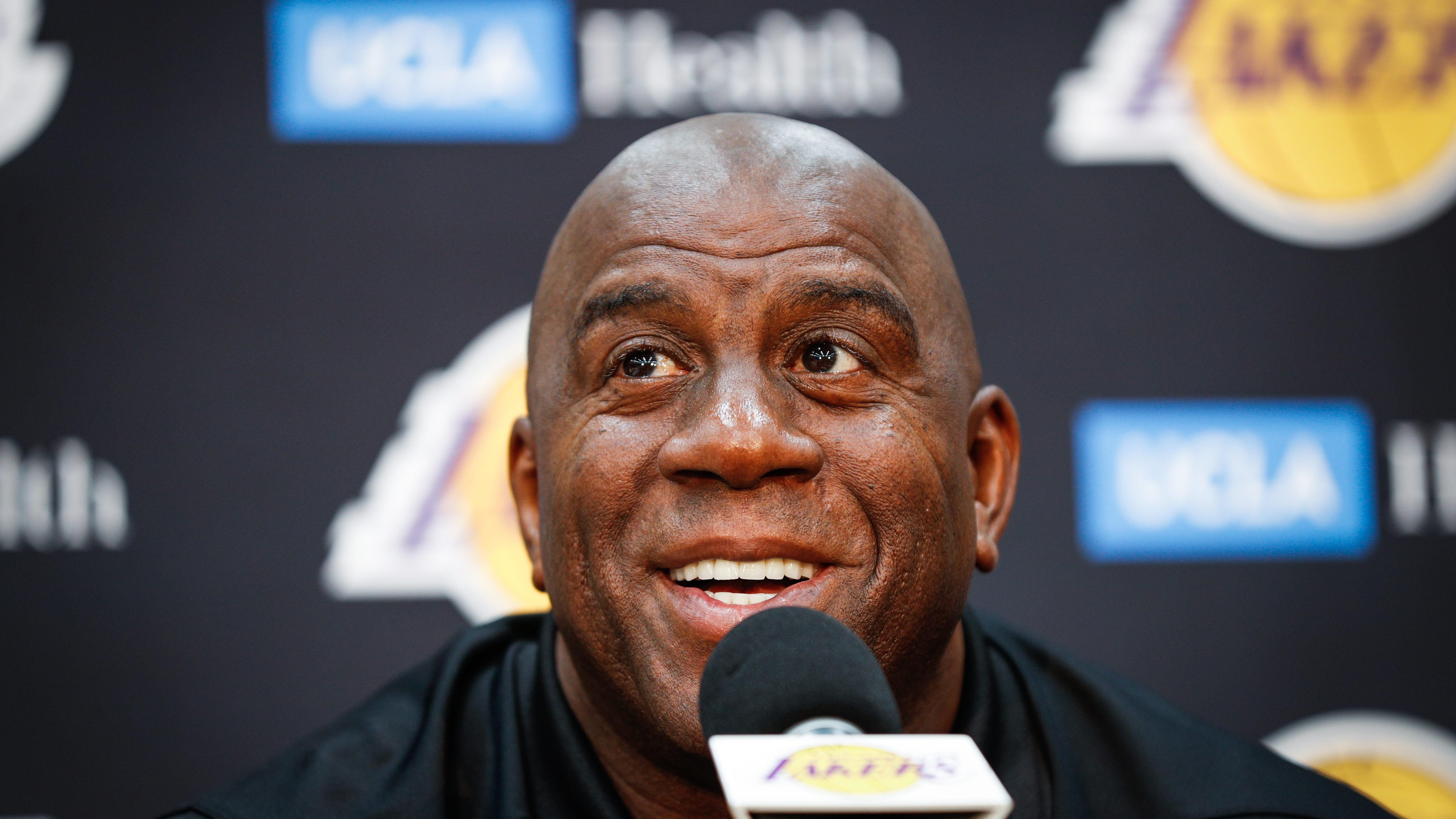 Magic Johnson speaks after Dan Snyder's agreement to sell Commanders becomes official