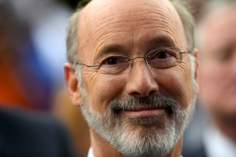 Pennsylvania Governor Tom Wolf reacts while listening to former President Barack Obama speak during a campaign rally for Wolf and Senator Bob Casey (D- PA) on September 21, 2018 in Philadelphia, Pennsylvania.