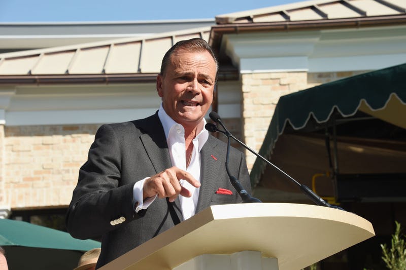 FILE - Developer Rick Caruso attends the Palisades Village grand opening private ribbon-cutting ceremony at Palisades Village on September 22, 2018 in Pacific Palisades, Calif. 