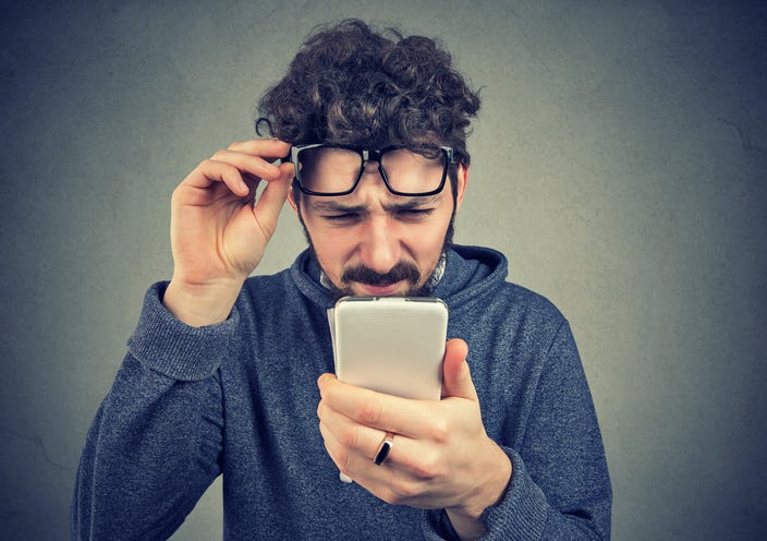 Man Having Trouble Seeing