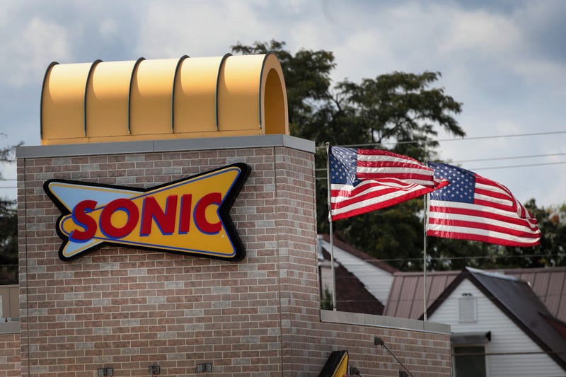  A sign hangs on the side of a Sonic restaurant on September 25, 2018 in Cicero, Illinois.
