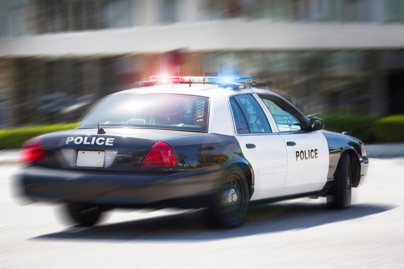 police car speeding off