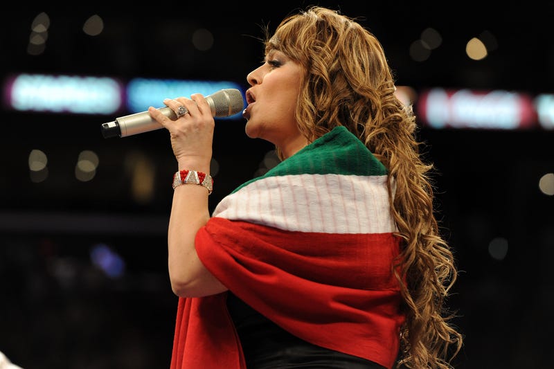 LOS ANGELES, CA - SEPTEMBER 18: Jenny Rivera sings the Mexican national anthem before the Middleweight bout against Shane Mosley and Sergio Mora at Staples Center on September 18, 2010 in Los Angeles, California.