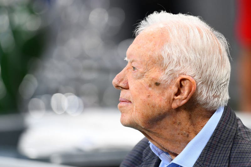 Former president Jimmy Carter prior to the game between the Atlanta Falcons and the Cincinnati Bengals at Mercedes-Benz Stadium on September 30, 2018 in Atlanta, Georgia.