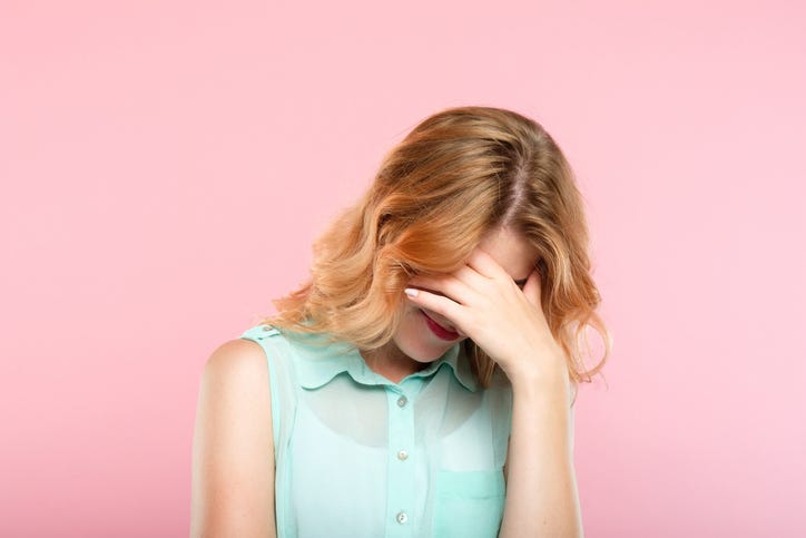 Embarrassed woman