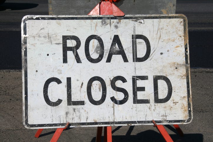 sign says road closed