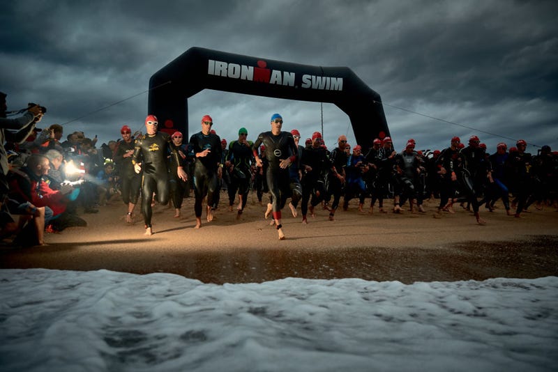 Pro male athletes start the swimming course of the Ironman Barcelona 2018 on October 7, 2018 in Calella, near Barcelona, Spain.