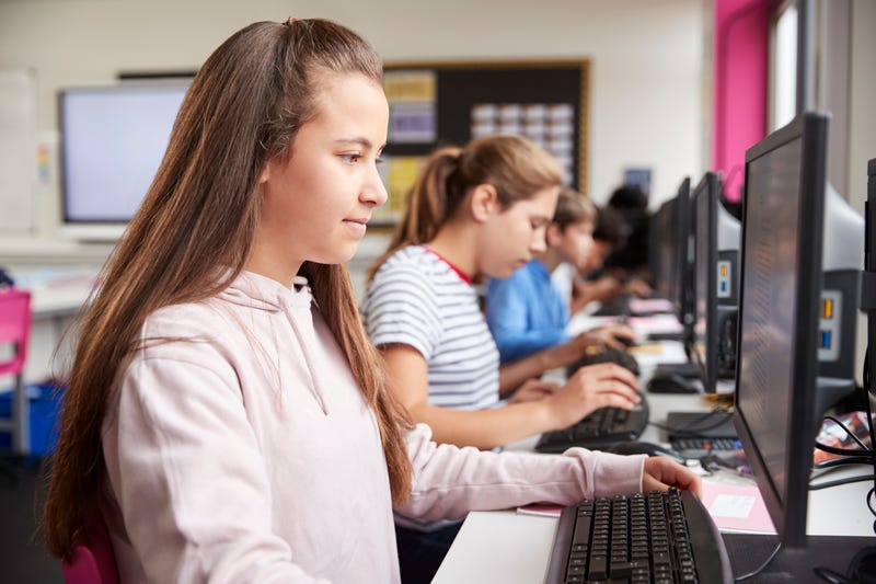 High school students on computers