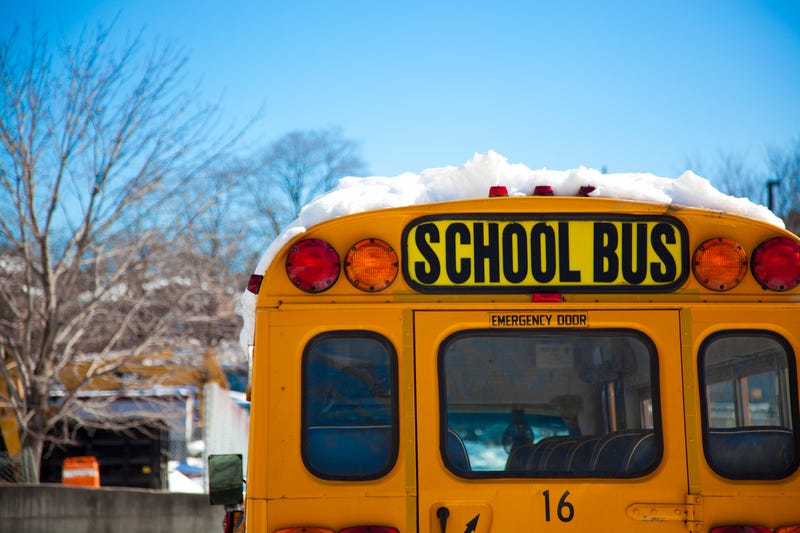 School bus with snow on the roof