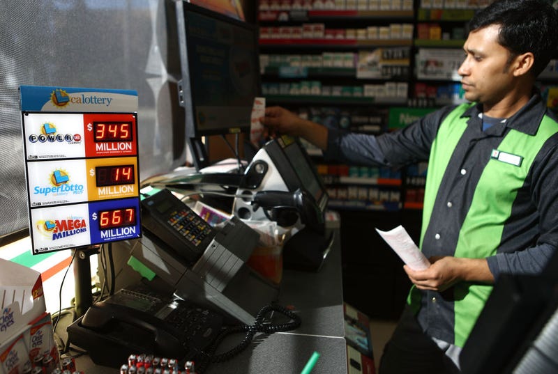 A worker processes lottery tickets on October 16, 2018 in Los Angeles, California.