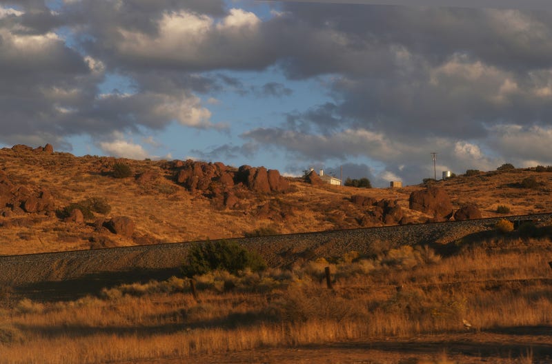 desert landscape with clouds overhead