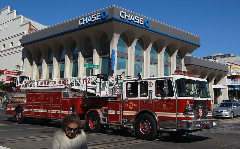 A San Francisco Fire Department fire truck driven by a Chase bank on October 13, 2010 in San Francisco, California.