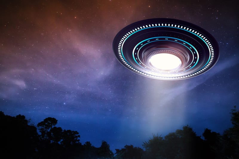 3d rendering of an alien spaceship in the sky