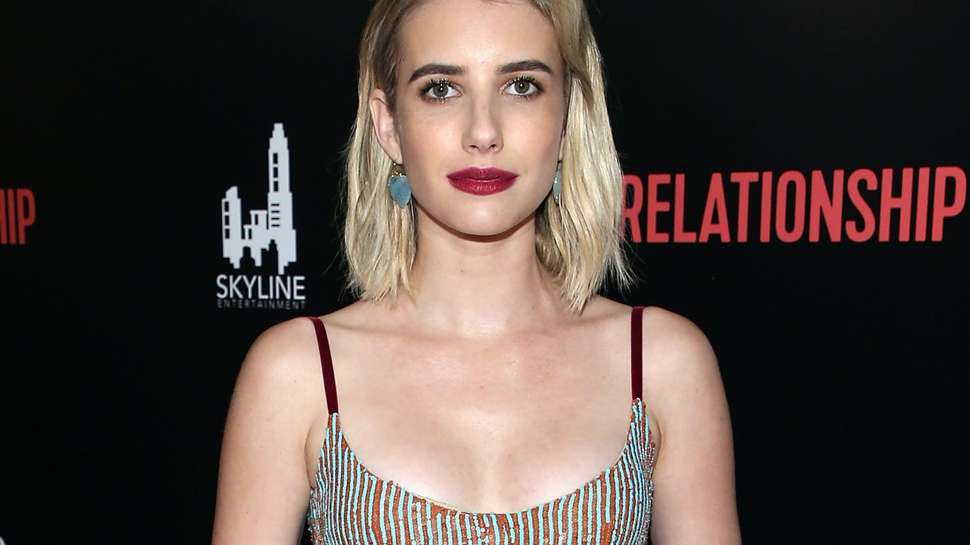 Emma Roberts soaks up the sun in pink bikini during tropical getaway: ‘Last day in paradise’