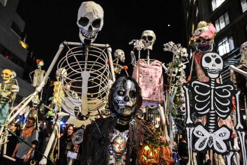 People in costumes participate in the annual Village Halloween parade on Sixth Avenue on October 31, 2018 in New York City.