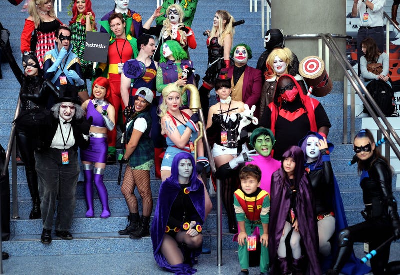 Cosplayers dressed as DC Comics characters pose for a photo during Los Angeles Comic Con at Los Angeles Convention Center on October 27, 2018