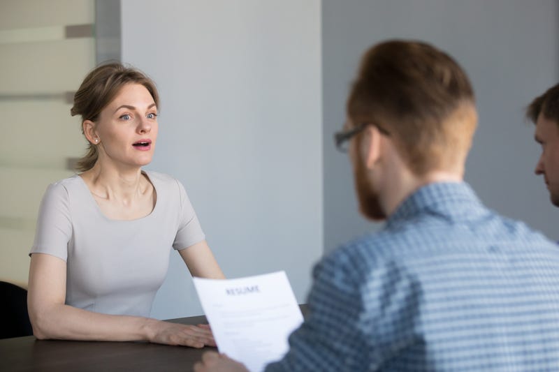 female interviewer looks surprised by question