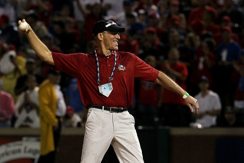 Texas Rangers television announcer Tom Grieve throws out the first pitch prior to the Rangers playing the New York Yankees in Game Six of the ALCS during the 2010 MLB Playoffs at Rangers Ballpark in Arlington on October 22, 2010 in Arlington, Texas. (Photo by Stephen Dunn/Getty Images)