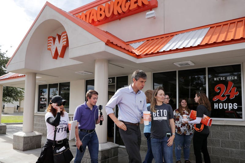 Beto O'Rourke (D-TX) (C), his Logistics and Events Manager Cynthia Cano (L), campaign Communications Director Chris Evans and O'Rourke's sister Charlotte O'Rourke head back out to canvass after lunch at a Whataburger November 3, 2018