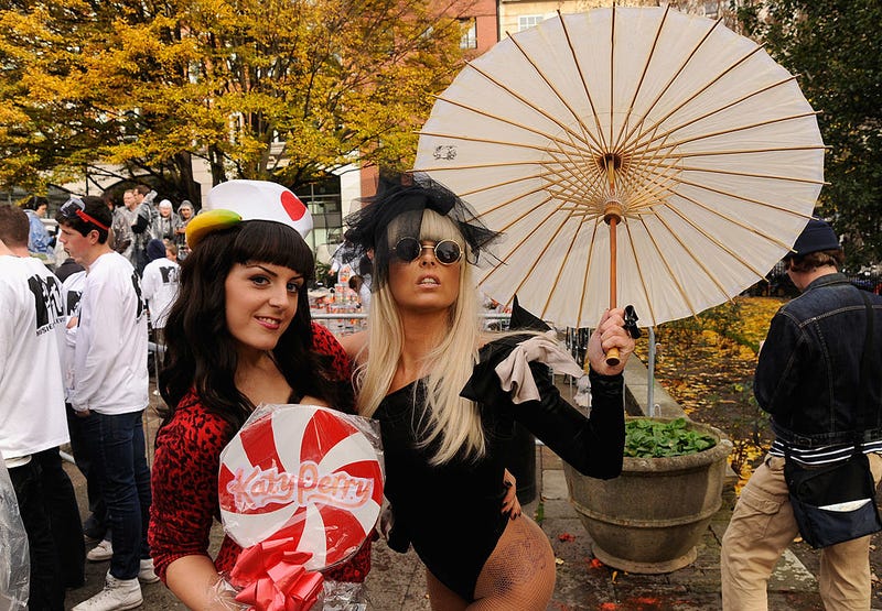 Katy Perry lookalike Delia Marie Williams and Lady Gaga lookalike Victoria Cluskey pose before the MTV Giant Tomato Fight in Golden Square on November 2, 2010 in London, England. 