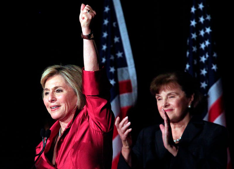 U.S. Sen. Barbara Boxer (D-CA) speaks during a post election party as U.S. Sen. Dianne Feinstein (D-CA) watches November 2, 2010 in Hollywood, California.