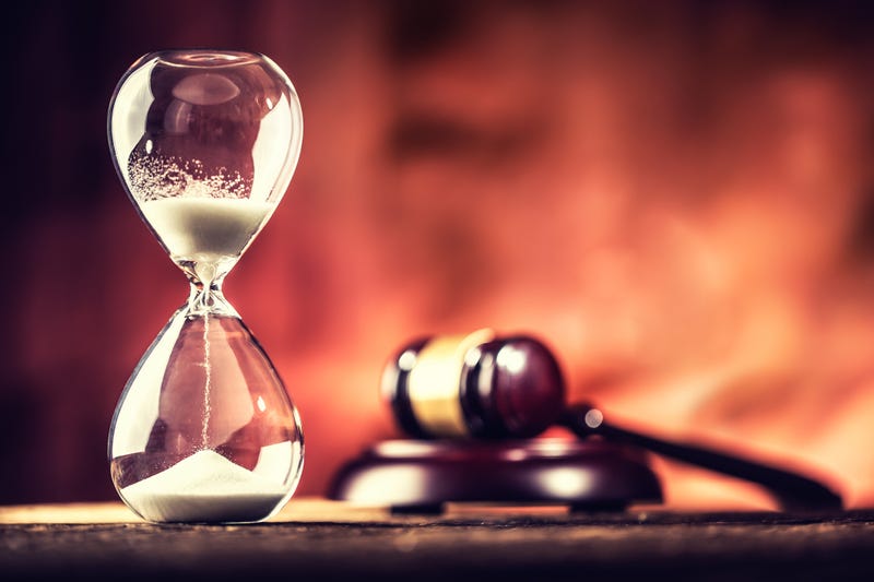 Hourglass law stock photo.