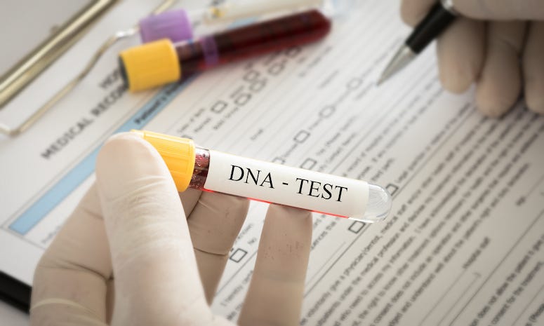Scientist holding DNA test