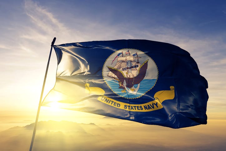 U.S. Navy flag.