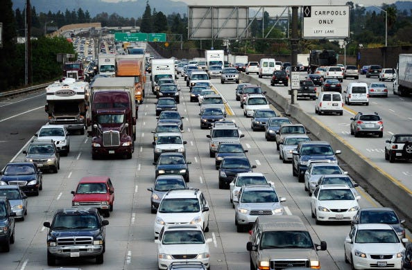Traffic stacks up on the west- and east-bound lanes of the 210 Foothill Freeway near Los Angeles as Thanksgiving holiday travelers hit the freeways on November 24, 2010 in Duarte, California. Thanksgiving holiday travel is expected to increase 11 percent from 2009 according to AAA. (Photo by Kevork Djansezian/Getty Images)