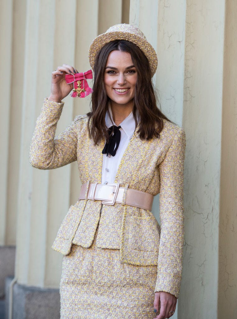 Keira Knightley flaunts her Officer of the Order of the British Empire at Buckingham Palace in 2018