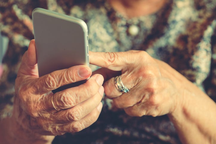 elderly woman on phone