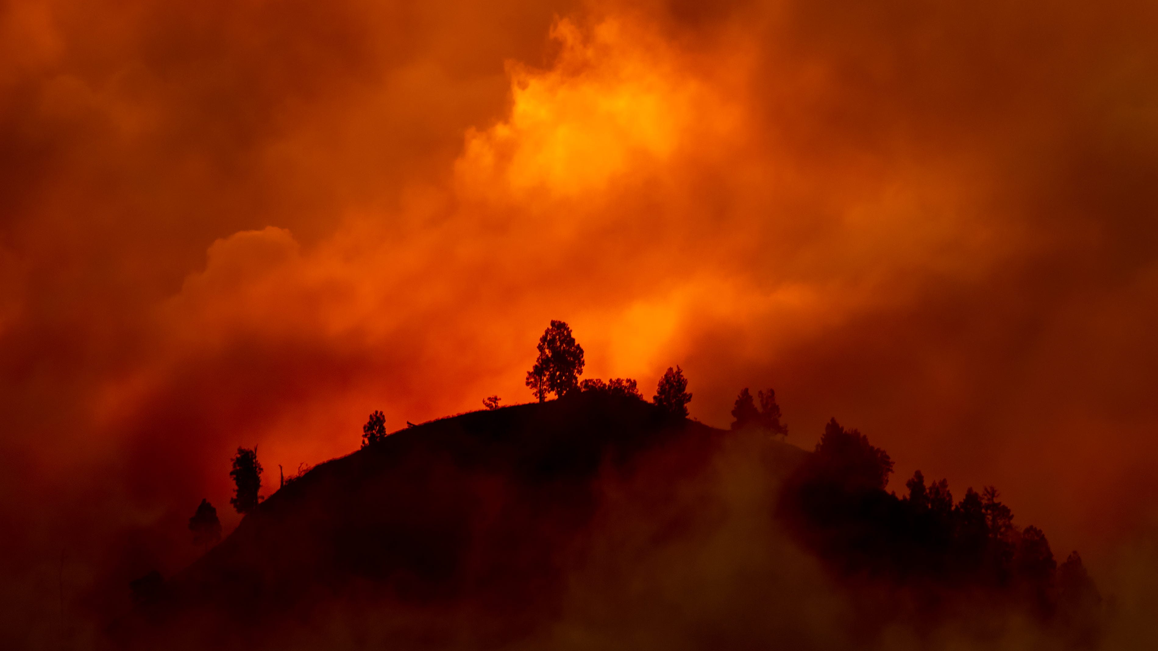 Brush fire erupts on Bradford Island; some residents evacuate while most battle blaze