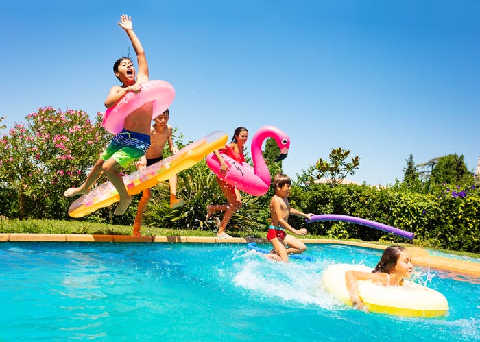 Kids Jumping In A Pool